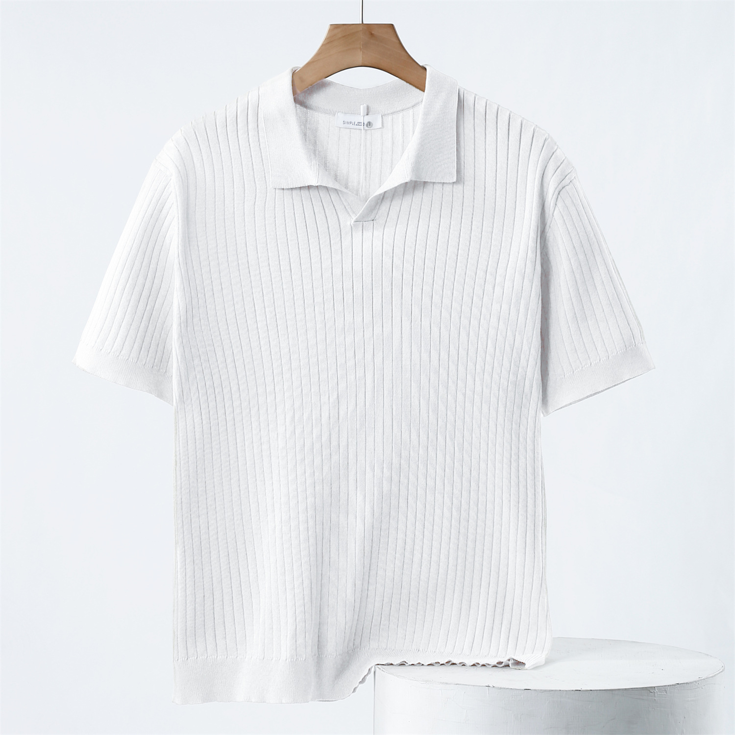 Striped short-sleeve knit polo shirt