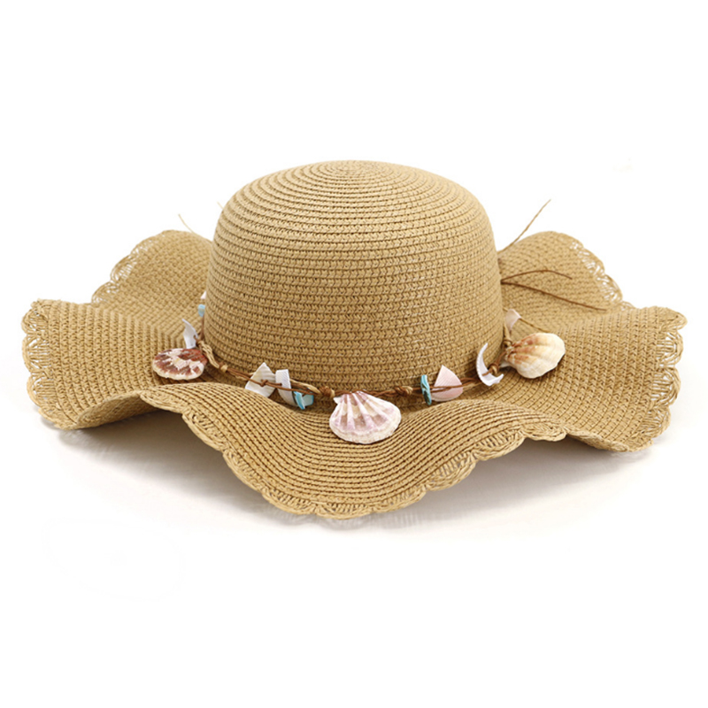 Women's summer paper straw hats with wide wavy brim